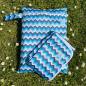 Preview: Blümchen Geschenkset Wickelunterlage Wetbag WAVE