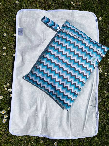 Blümchen Geschenkset Wickelunterlage Wetbag WAVE
