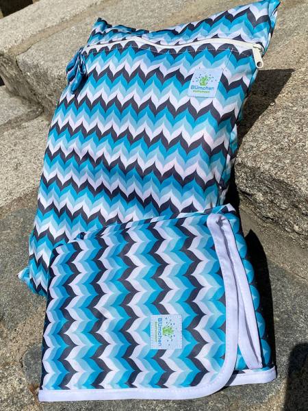 Blümchen Geschenkset Wickelunterlage Wetbag WAVE
